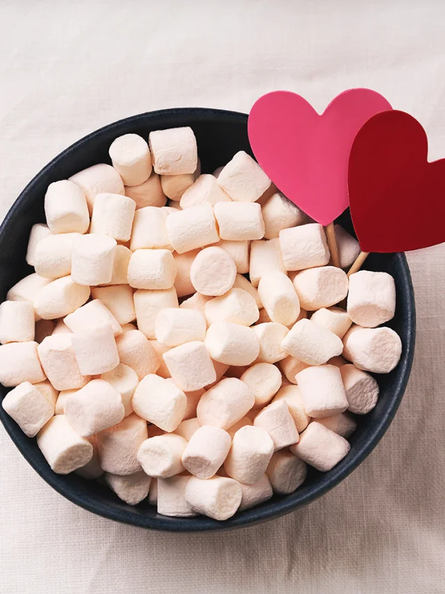 Red and pink hearts in marshmallow on white background. Top View. Flat Lay